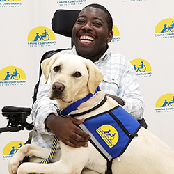 young man with service dog